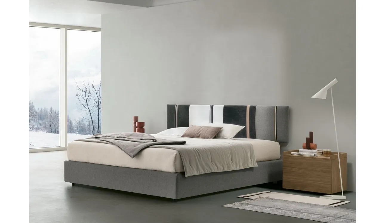 Letto sommier Diagonal con box contenitore e pannello testiera di Tomasella